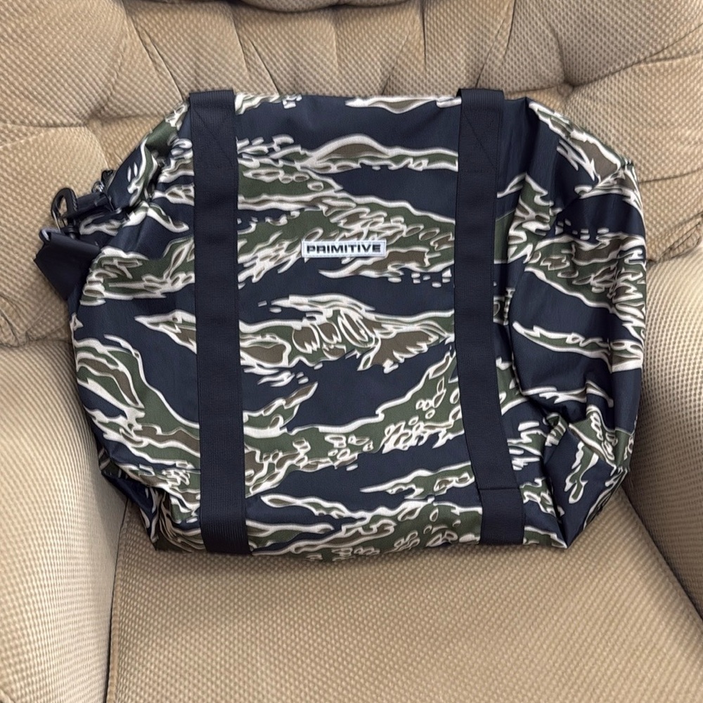 Primitive Green and Black Duffel Bag with Camouflage Design